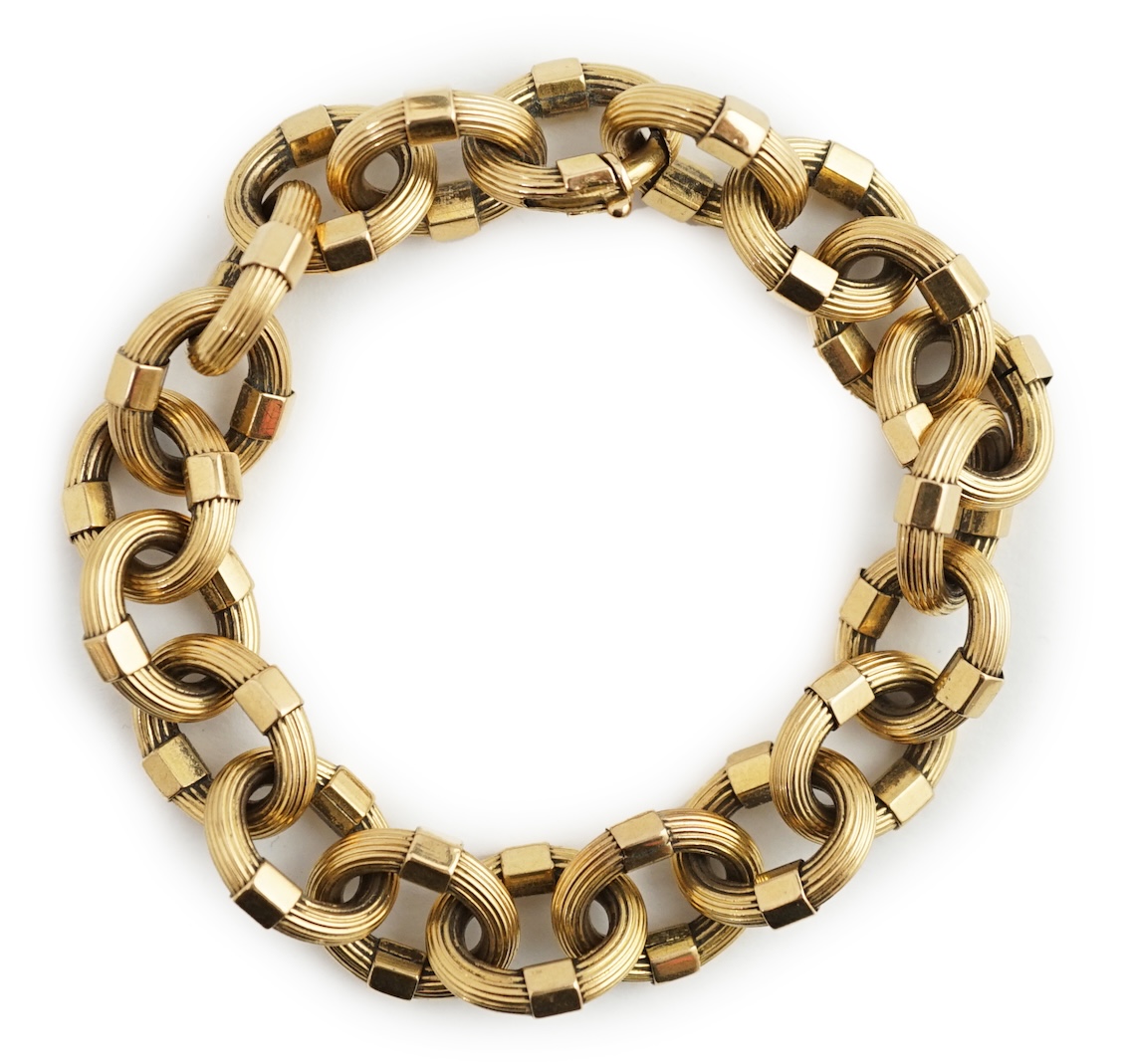 A late 20th century Italian 18k gold reeded oval link bracelet